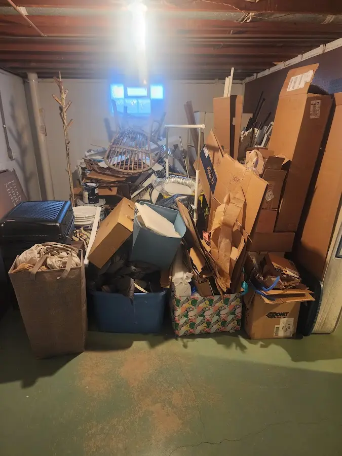 Roll-off dumpster container at job site for 20 Yard Dumpster Rental in Munford